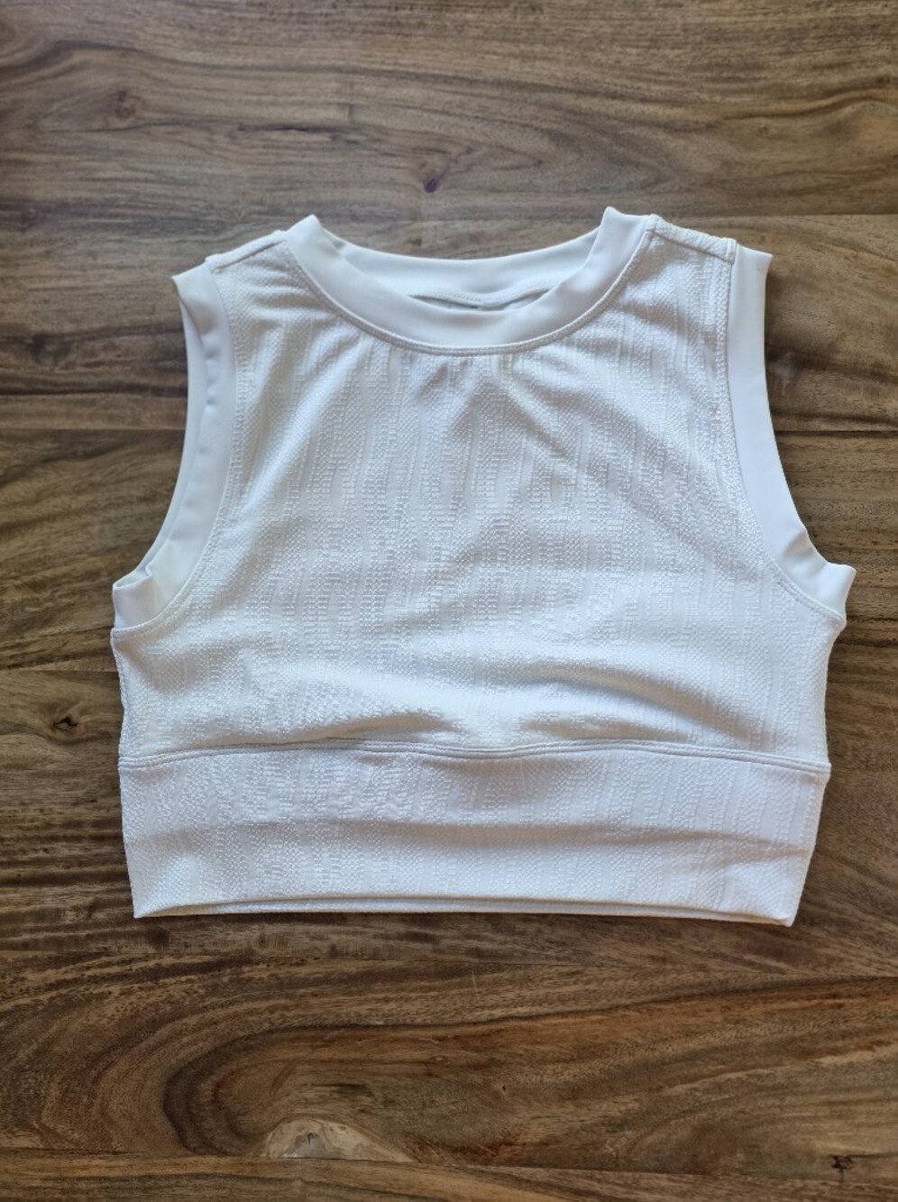 White textured athletic top is Brand SA Collective, Women's Size MEDIUM